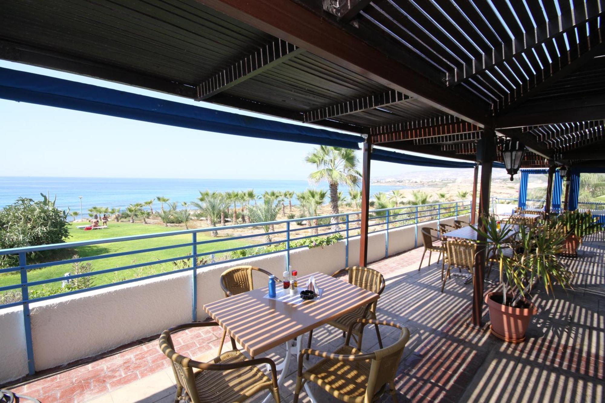 Helios Bay Hotel And Suites Klorakas Restaurante foto